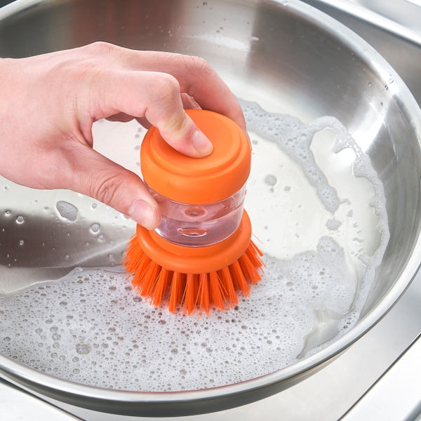 Dish-washing brush with dispenser, bright orange