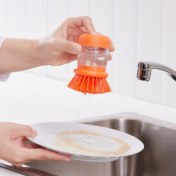 Dish-washing brush with dispenser, bright orange